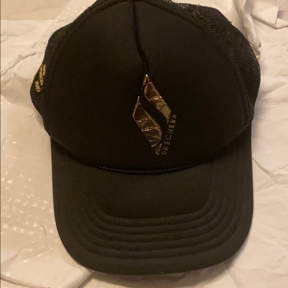 Skechers black and gold snap back old and aged